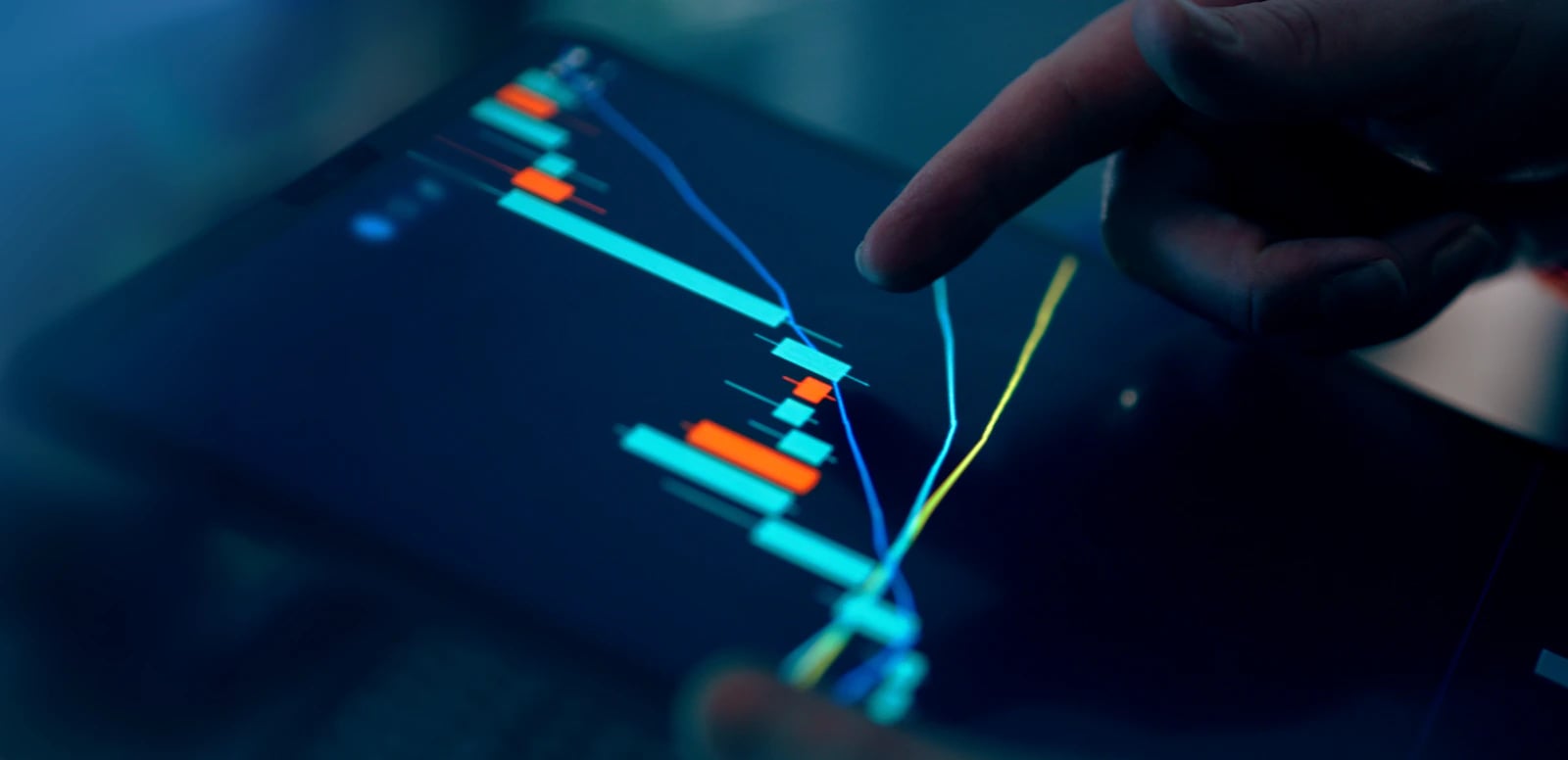 Reviewing a financial chart on a tablet