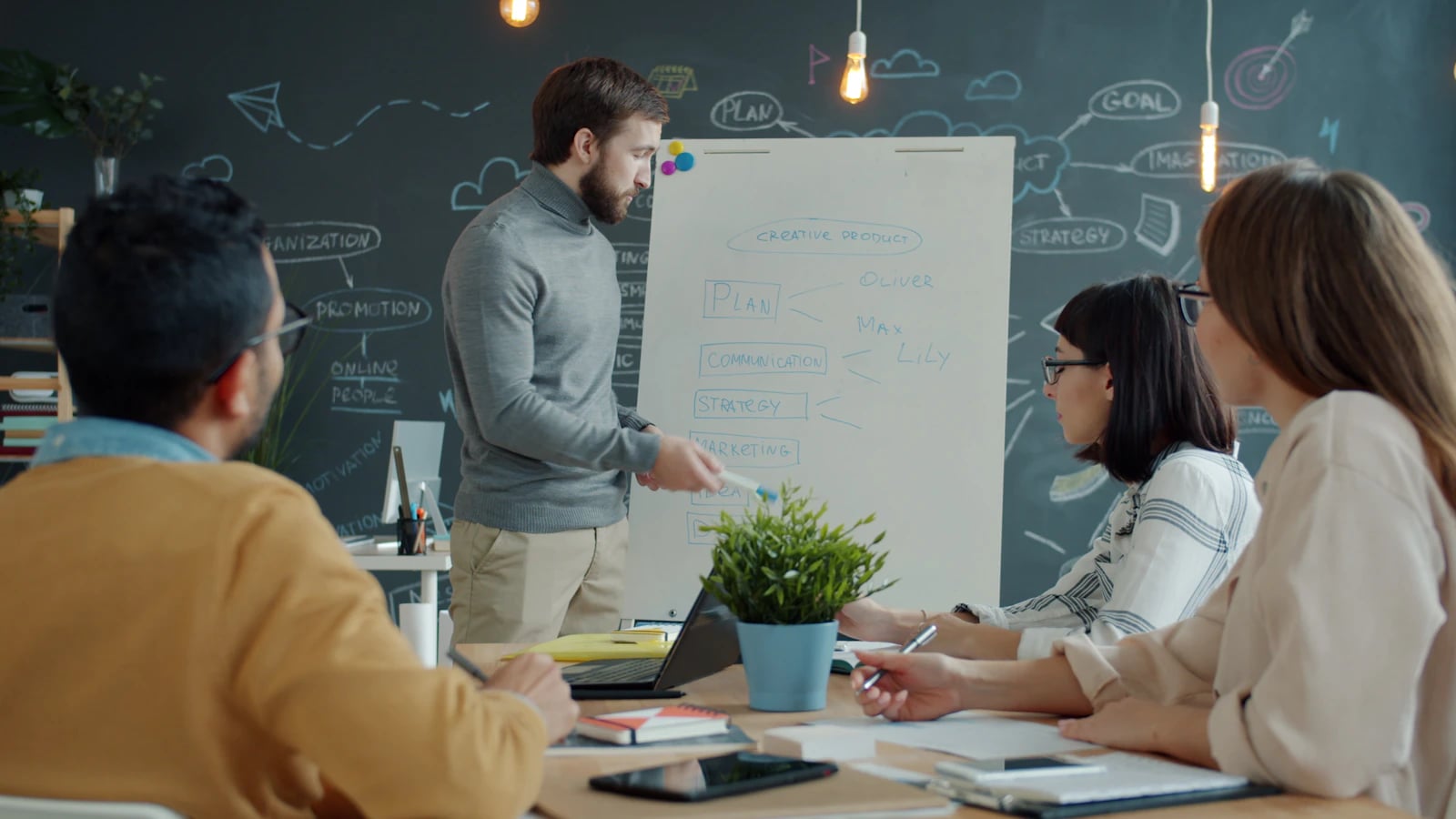 Colleagues presenting a business strategy