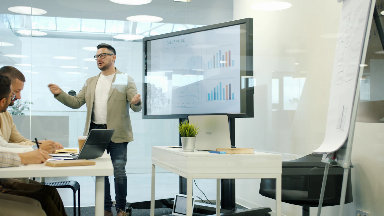 A presentation of charts to colleagues