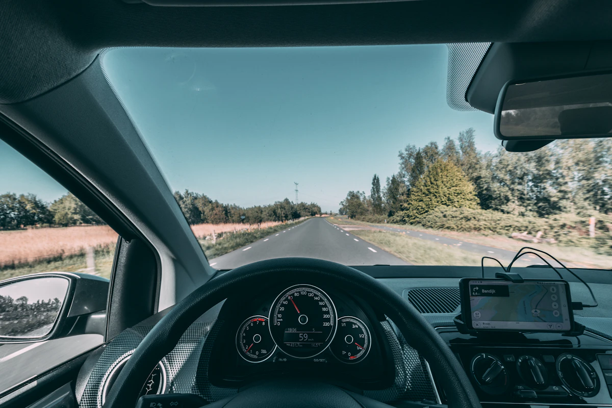 View of a road from inside a car